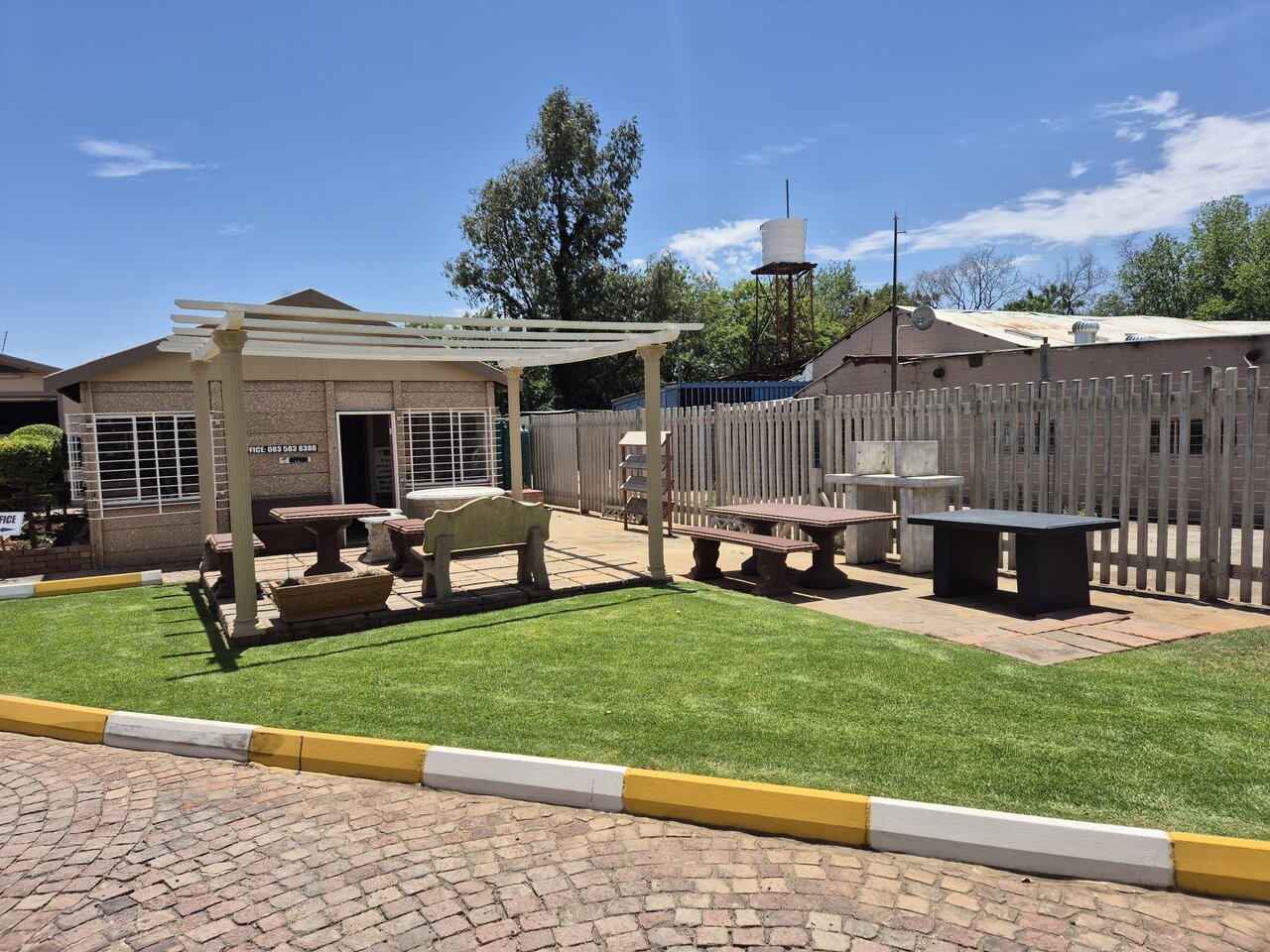The Safari Beton yard, showing precast tables, benches, road curbs and palisade fencing on display
